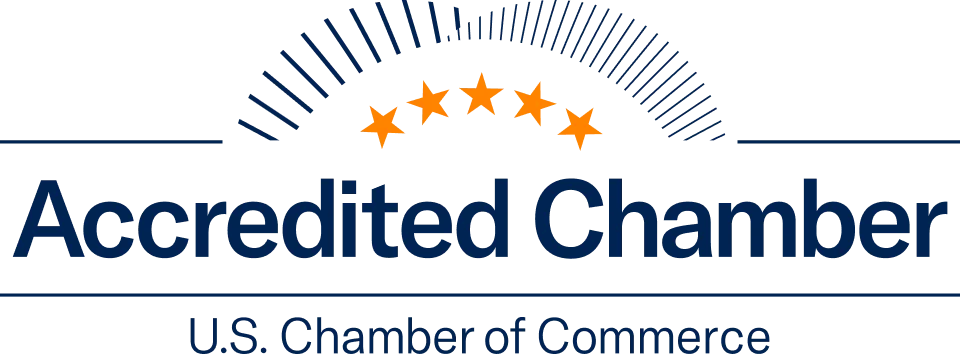 Logo of the Accredited Chamber by the U.S. Chamber of Commerce, featuring five stars and a blue arch design.